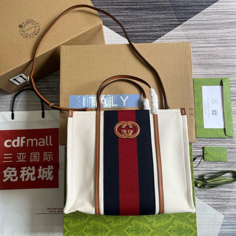 G*u*i shopping bags